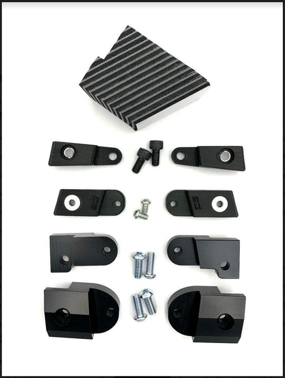 eDirtyBike Talaria Sting Seat Riser Kit with various riser parts for MX3 and MX4 models, displayed on a white background.