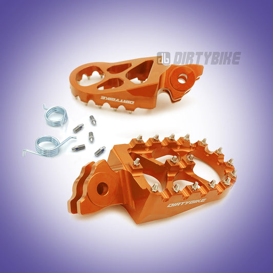Orange CNC aluminum foot pegs for Talaria MX and X3 eRide Pro bikes, designed for durability and style on off-road motorcycles.