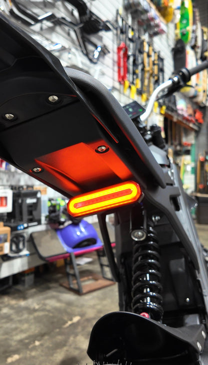 Project9 Talaria MX4/MX5 V2 CYBER tail light with sleek design and bright LED illumination for cycling safety.