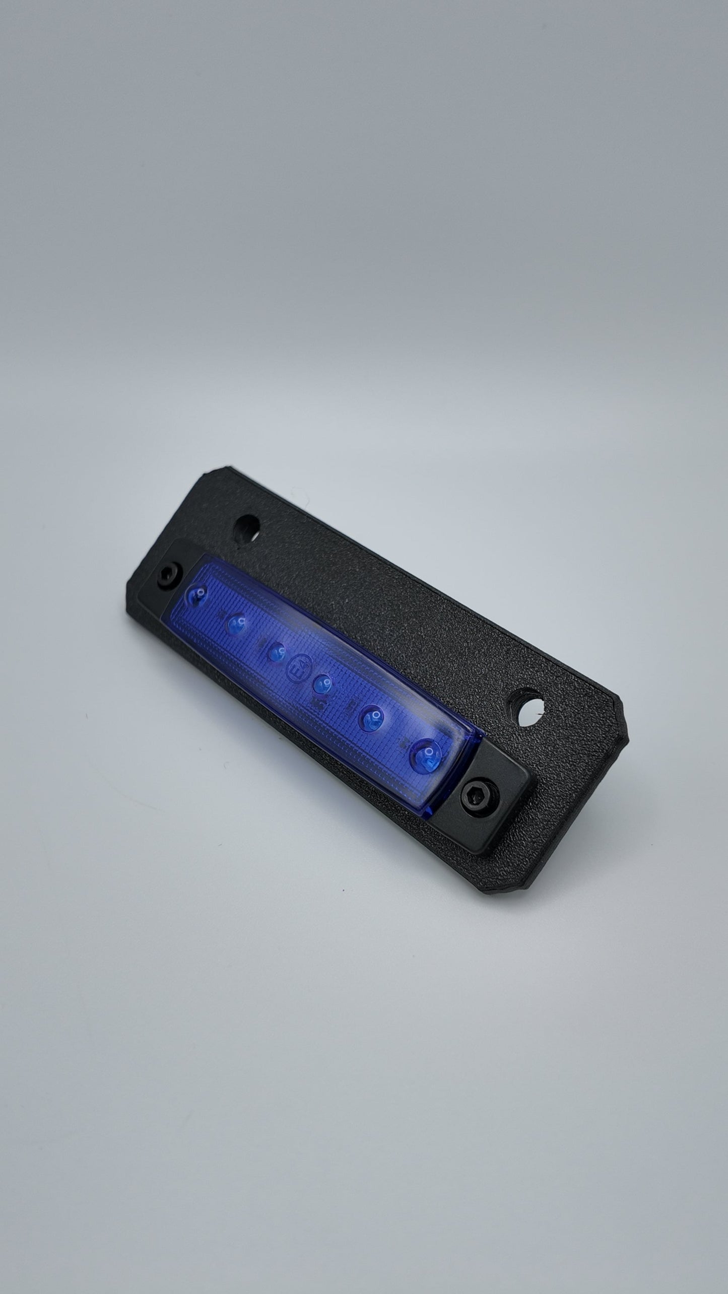 Project9 Talaria MX4 rear underglow kit with bracket, showcasing LED underglow lights installed on the motorcycle's rear underside.