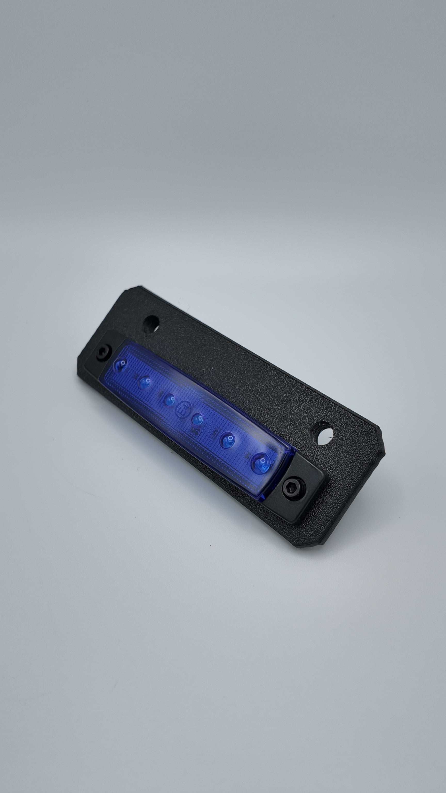 Project9 Talaria MX4 rear underglow kit with bracket, showcasing LED underglow lights installed on the motorcycle's rear underside.