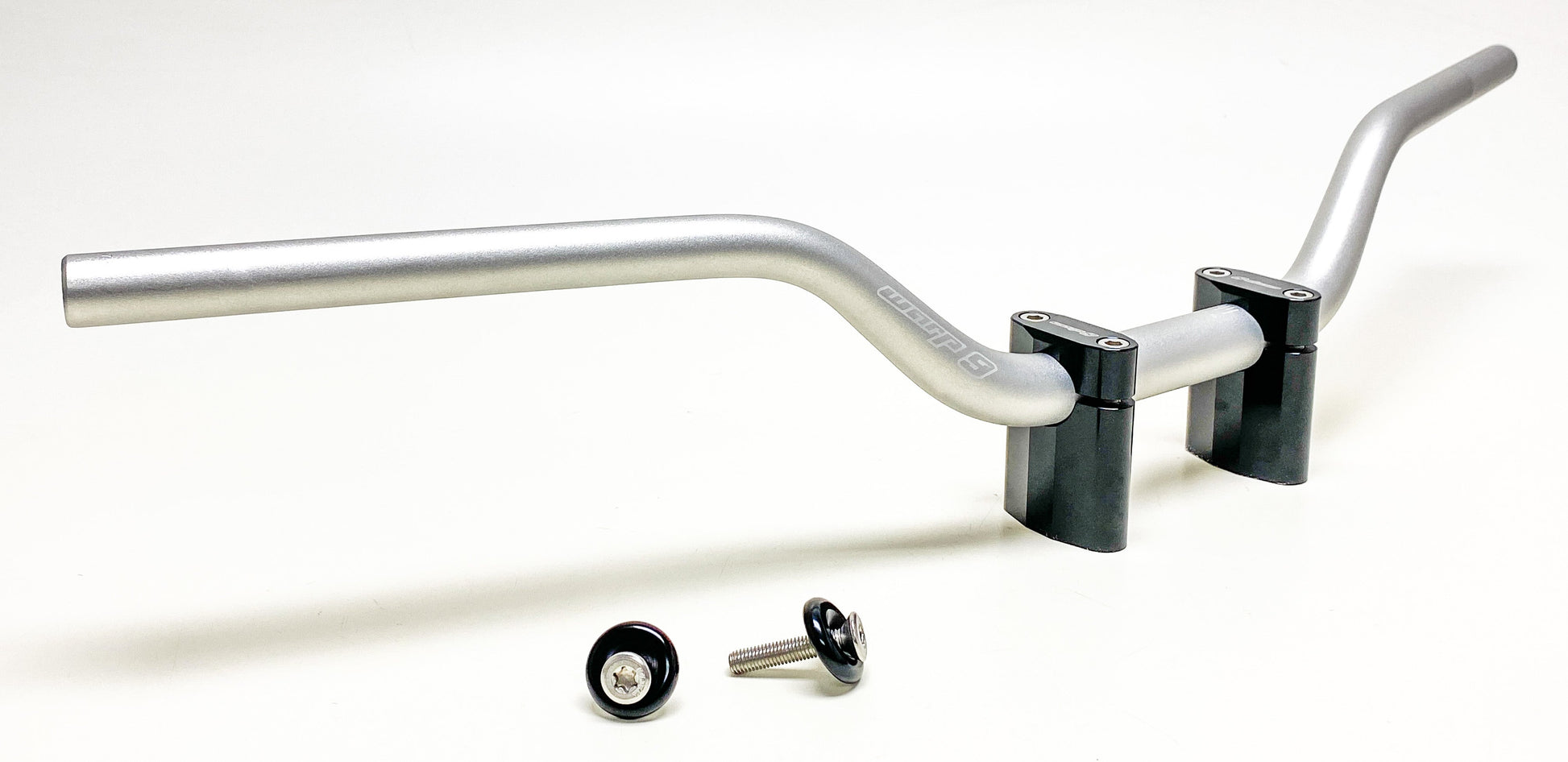 Silver MX/Offroad 1-1/8" tapped handlebars by Warp9Racing, showcasing the textured handlebar surface and mounting holes.