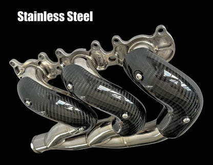 Stainless steel exhaust manifold for Triumph Rocket 3R & GT 2500cc, designed by Bill's Exhausts, shown on a Triumph motorcycle.