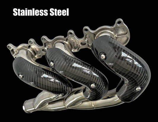 Stainless steel exhaust manifold for Triumph Rocket 3R & GT 2500cc, designed by Bill's Exhausts, shown on a Triumph motorcycle.