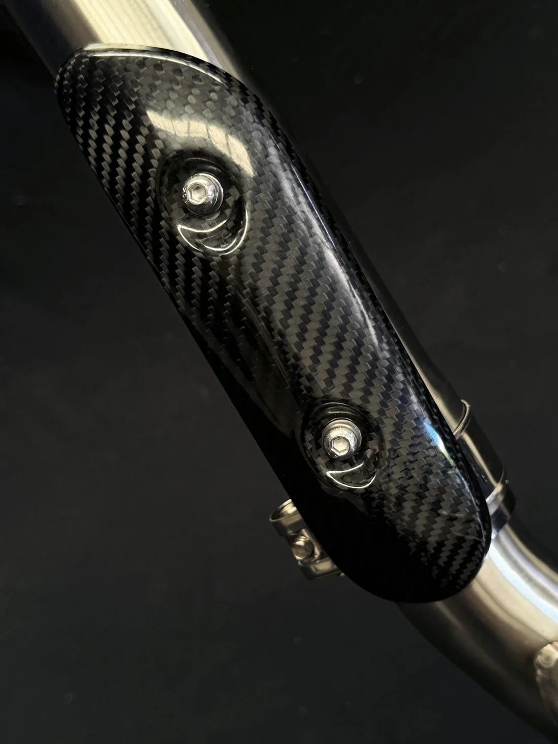 Triumph Tiger 900 full exhaust system by Bill's Exhausts with carbon fiber cover, in stock and ready for installation.