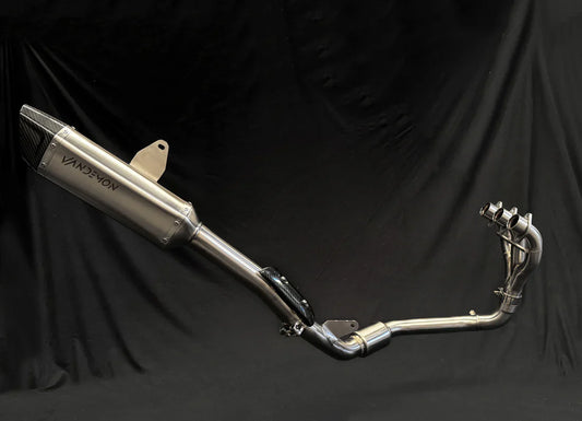 Stainless steel Triumph Tiger 900 exhaust system by Bill's Exhausts, showcasing the full exhaust setup mounted on the motorcycle.