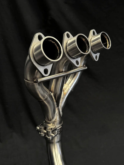 Stainless steel headers for Triumph Tiger 850-900 full exhaust system by Bill's Exhausts, shown on a motorcycle.