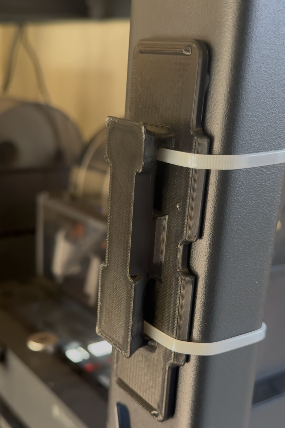 Universal Mount Plate by McCoy Industries, accessory plate for mounting applications, shown in black with mounting holes.