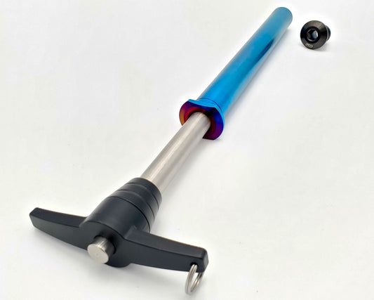 Warp9Racing Stark Varg Titanium Rear Axle showing a durable, lightweight bike component designed for electric mountain bikes.