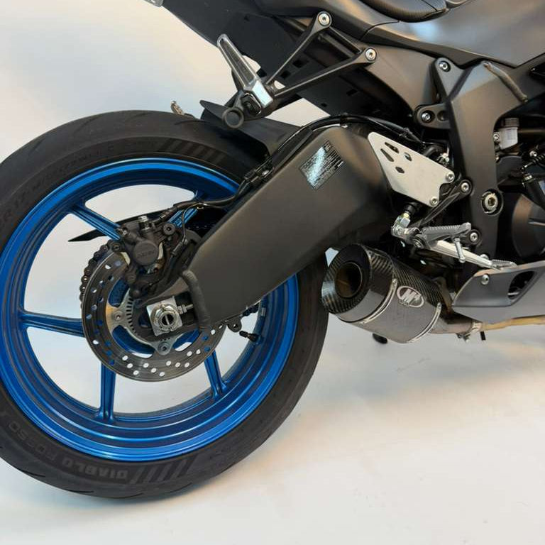 Carbon fiber street slayer slip-on exhaust for M4 ZX6R 2009-2026, featuring sleek design, branded by Bill's Exhausts.