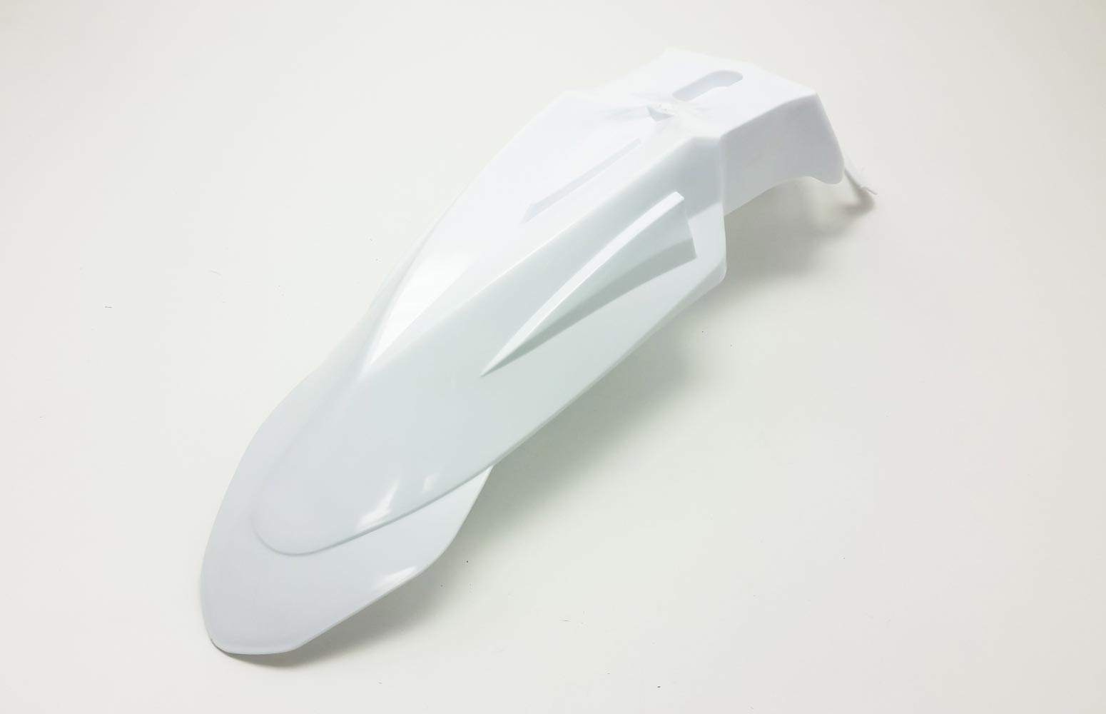 White Warp 9 SuperMoto front fender for MX to SM conversion, made of durable body plastics and fairings by Warp9Racing.