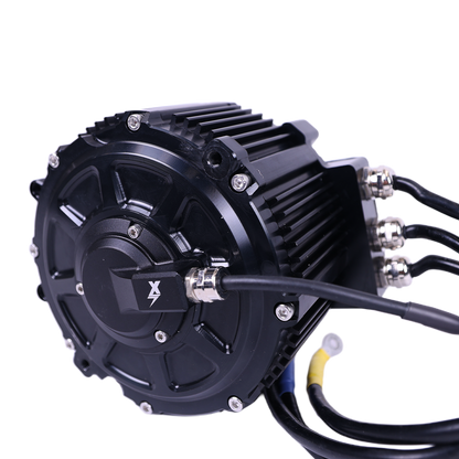 Charged Powersports EBMX XTA-60 Talaria electric motor shown from the side view, featuring compact design and cooling vents.
