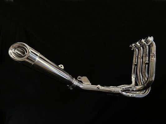 Polished titanium exhaust system for Kawasaki Ninja ZH2 2020-2025, open box, by Bill's Exhausts, showcasing sleek metallic finish.