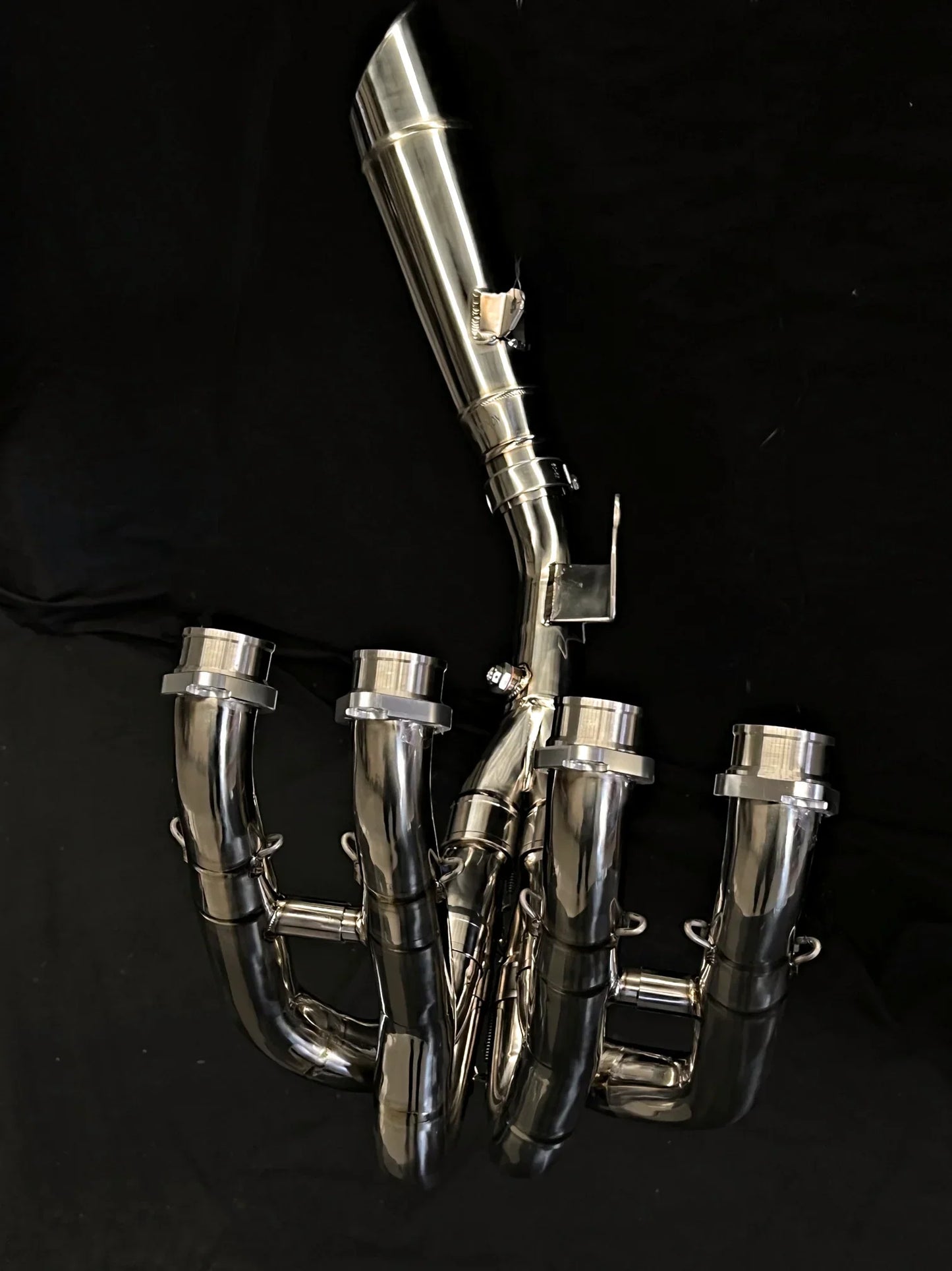 Polished titanium exhaust system for Kawasaki Ninja ZH2 2020-25 by Bill's Exhausts, showcasing the sleek, shiny metal finish.