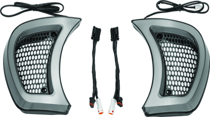 Kuryakyn Tracer Headlight Vent Accents for Harley-Davidson Road Glide, showcasing sleek chrome motorcycle headlight vent covers.