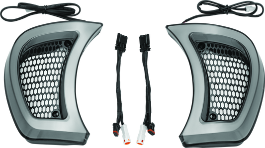 Kuryakyn Tracer Headlight Vent Accents for Harley-Davidson Road Glide, showcasing sleek chrome motorcycle headlight vent covers.