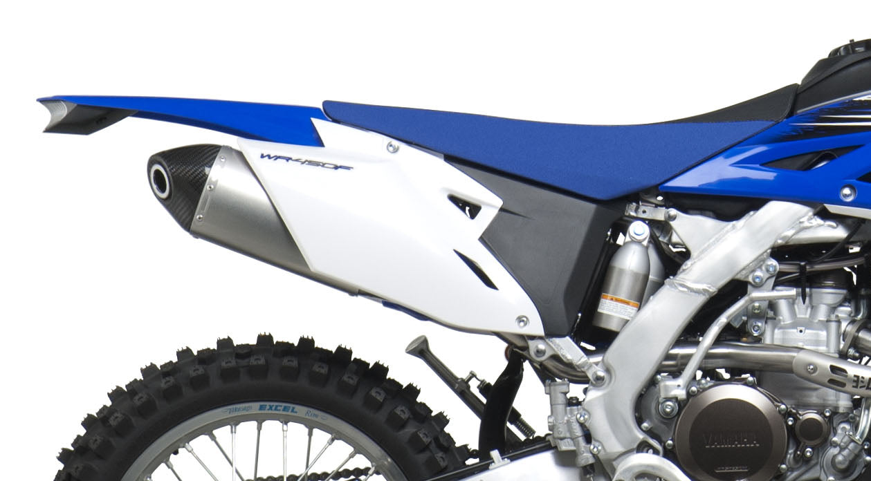 YOSHIMURA RS-4 motorcycle header and exhaust system with polished metal finish and sleek design for performance enhancement