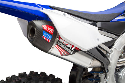 YOSHIMURA RS-12 dirt bike exhaust system with aluminum body and carbon fiber end cap, showcasing sleek metallic and black finish.