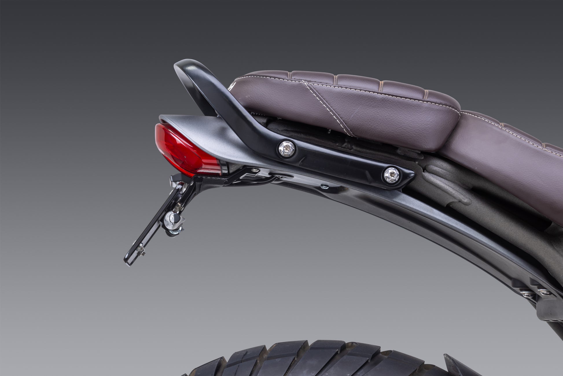 YOSHIMURA V2 Fender Eliminator Kit for motorcycle tail light assembly, featuring sleek design and installation components.