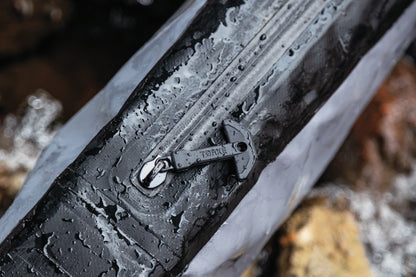 Kuryakyn Torke Dry Rifle Case, waterproof and submersible, designed for hunting and range protection, shown with rifle inside.