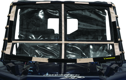 QuadBoss Polaris Ranger 1000 Diesel soft windshield with screen options, shown installed on the vehicle in a rugged outdoor setting.