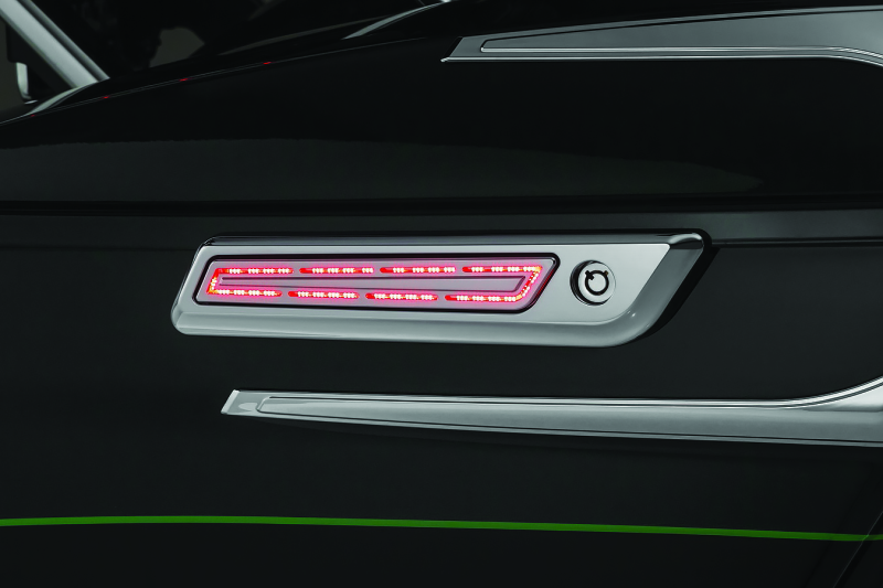Kuryakyn LED saddlebag hinge accents for Harley Davidson with Chip-on-Board LED technology, showcasing sleek motorcycle lighting details