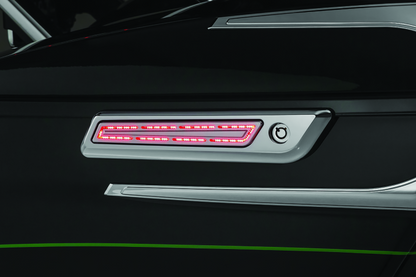 Kuryakyn LED saddlebag hinge accents for Harley Davidson with Chip-on-Board LED technology, showcasing sleek motorcycle lighting details