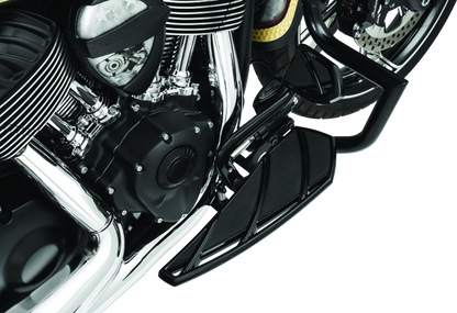 Kuryakyn Phantom black floorboards for Indian motorcycles, showing textured rubber surface and mounting hardware.
