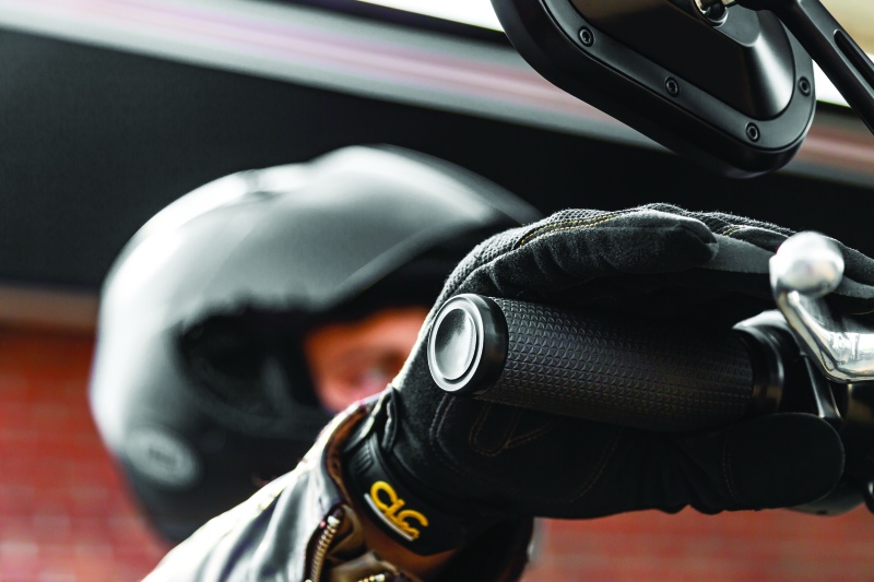Kuryakyn Thresher Grips for throttle-by-wire motorcycles, black ergonomic hand grips with shark tooth knurling for added grip.