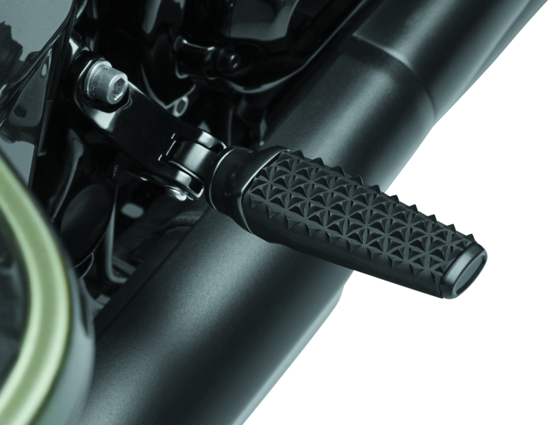 Black Kuryakyn Thresher Pegs with Adapter for Harley-Davidson motorcycles, shown mounted on motorcycle footpeg brackets.