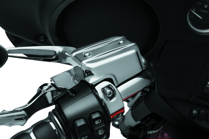 Chrome Kuryakyn Brake and Clutch Control Covers for Harley Davidson Touring motorcycles, featuring sleek metal finish.