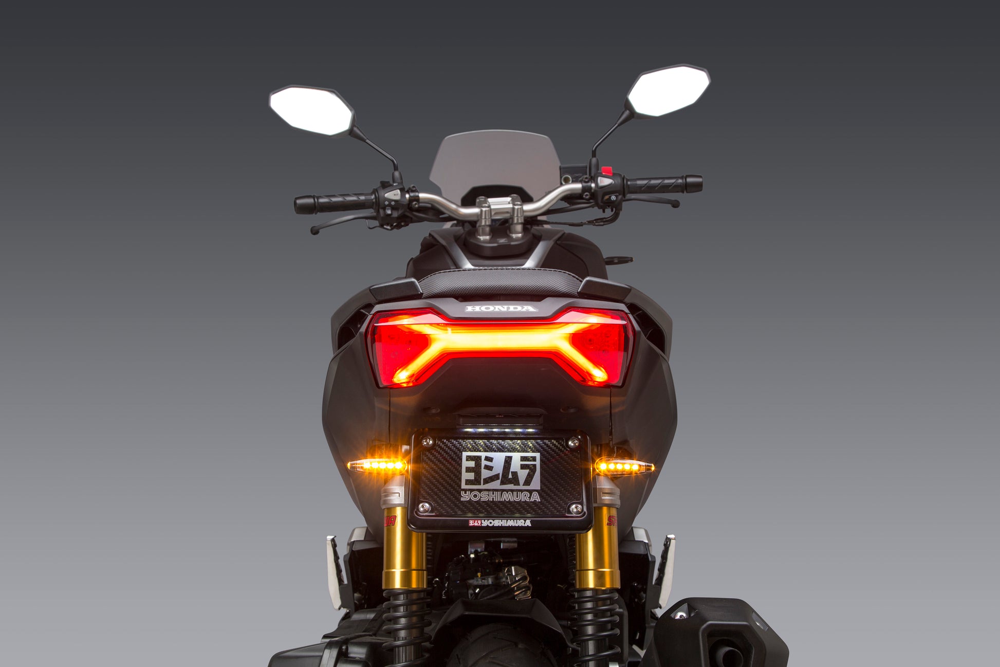YOSHIMURA Fender Eliminator Kit for Honda motorcycle models, shown with mounting hardware and sleek, streamlined design