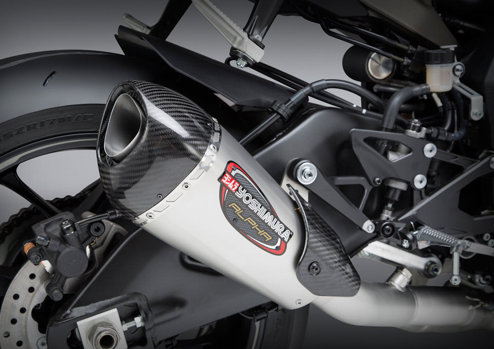 YOSHIMURA RS-12 ADV Alpha T slip-on exhaust with matte carbon fiber end cap and works finish, designed for motorcycle performance