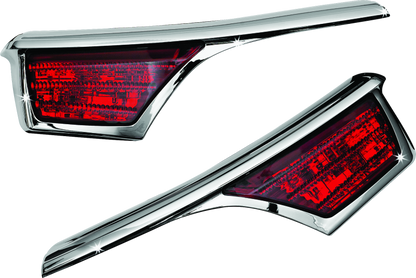 Kuryakyn LED passenger armrest trim with turn signals for Honda Gold Wing GL1800, chrome finish, visible on motorcycle seat.