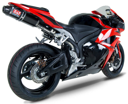 YOSHIMURA RS-5 Slip-On SS CF exhaust for UTVs, showing the stainless steel and carbon fiber finish on the motorcycle exhaust system.