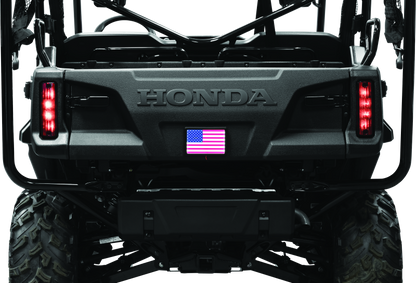 Kuryakyn Freedom Flag LED 4x6 inch black lighting for powersports vehicles, featuring a patriotic flag design on a sleek black LED light.