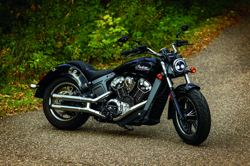 Kuryakyn Phantom motorcycle mirrors in gloss black with aggressive angular design and premium chrome finish, mounted on handlebars.