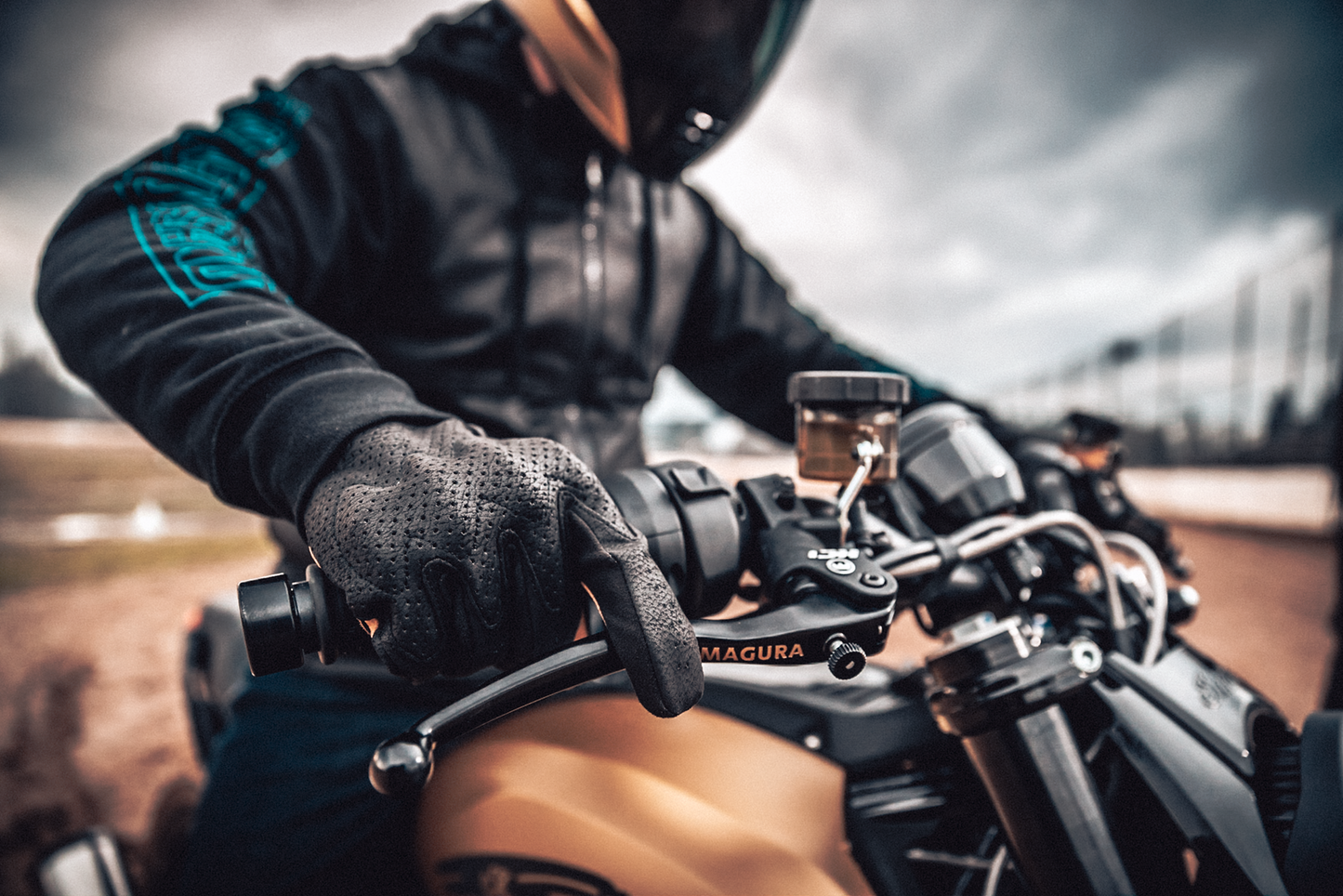 Black ICON Airform™ gloves in large size featuring a sleek design, made by Bill's Exhausts for comfortable fit and protection.