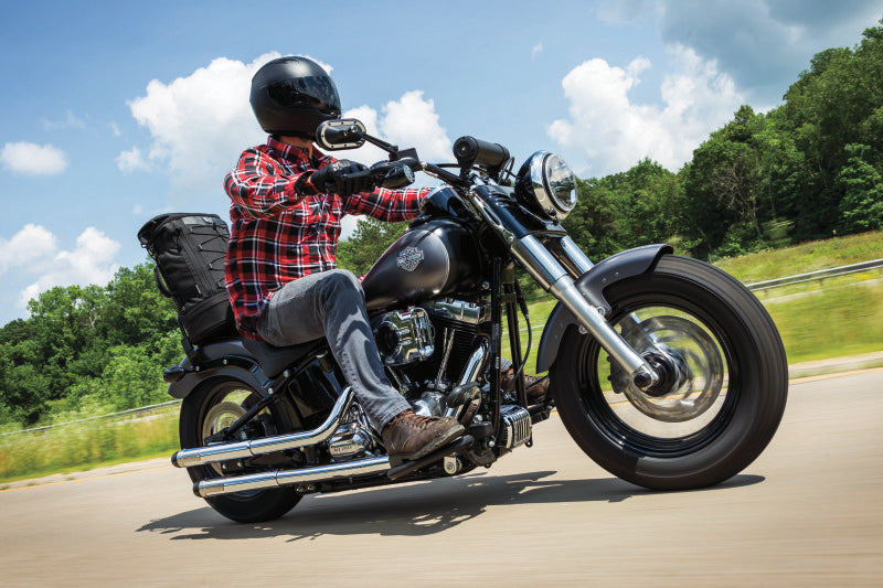 Kuryakyn Momentum Freeloader Duffle for Powersports mounted on a sissy bar, showing quick-mount design and spacious storage.