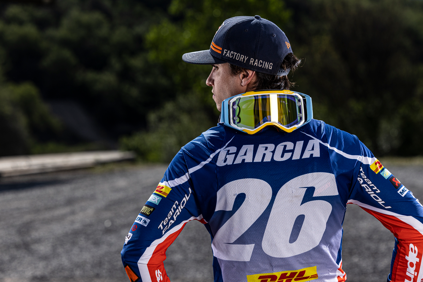 Scott Prospect goggles in white and blue with yellow accents, designed for motocross and off-road riding.