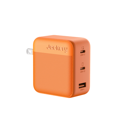 Jackery 102W GaN 3-port fast charger, compact black power adapter with USB charging ports