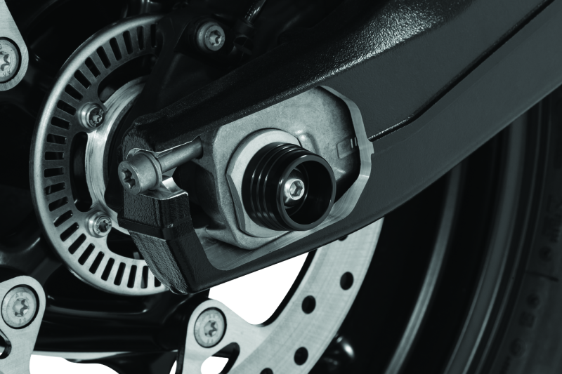 Kuryakyn Lodestar rear axle slider for BMW S1000RR and HP4 motorcycles, providing protection for the rear axle area.