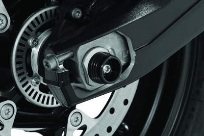 Kuryakyn Lodestar rear axle slider for BMW S1000RR and HP4 motorcycles, providing protection for the rear axle area.