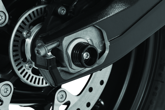 Kuryakyn Lodestar rear axle slider for BMW S1000RR and HP4 motorcycles, providing protection for the rear axle area.
