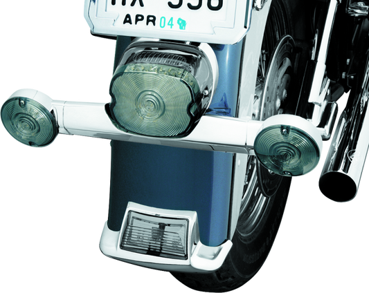 Chrome Kuryakyn Narrow Turn Signal Bar for Harley Davidson motorcycles, part #2384, mounted on bike with detailed chrome finish.