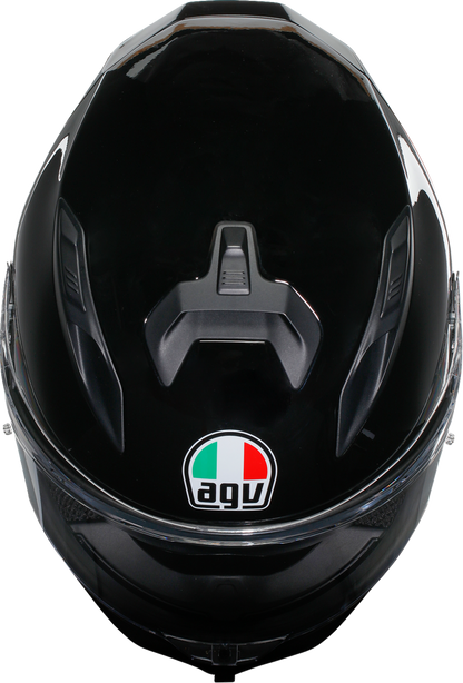 AGV K7 helmet in gloss black, 2XL, showing aerodynamic design and advanced safety features on the helmet surface.