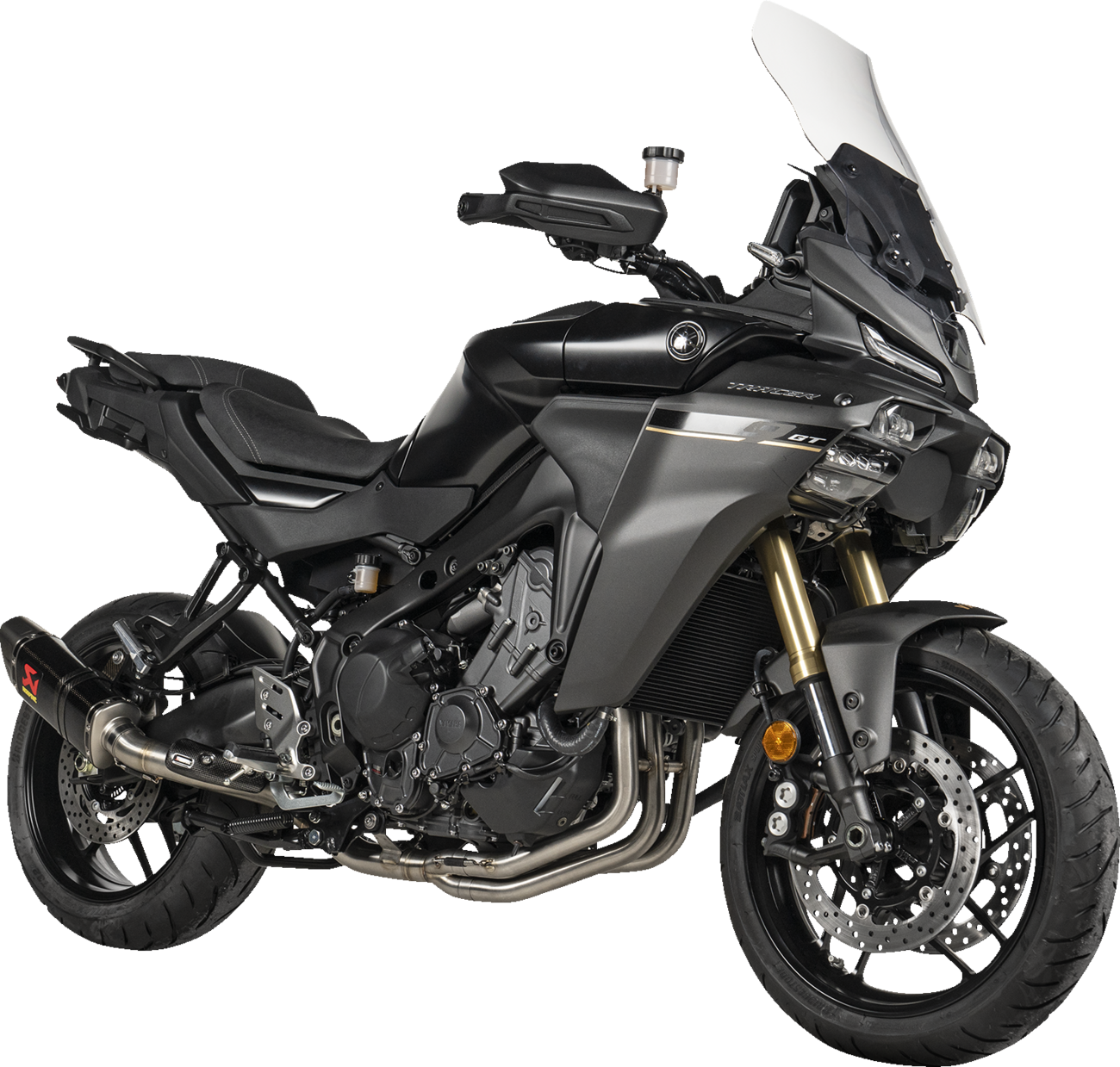 AKRAPOVIC Racing Line exhaust system with carbon fiber finish for Yamaha Tracer 9 motorcycle, showcasing sleek design and high-performance details.