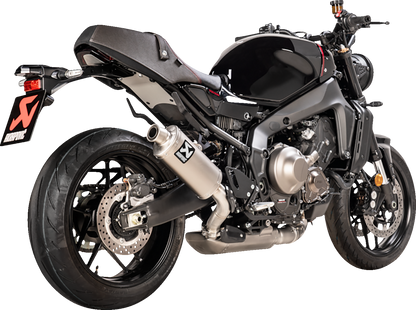 AKRAPOVIC Racing Line titanium exhaust system for Yamaha XSR 900, showing the sleek titanium finish and exhaust pipes.