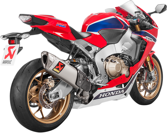 AKRAPOVIC titanium muffler for Honda CBR1000RR motorcycle, showcasing sleek titanium finish and exhaust design.
