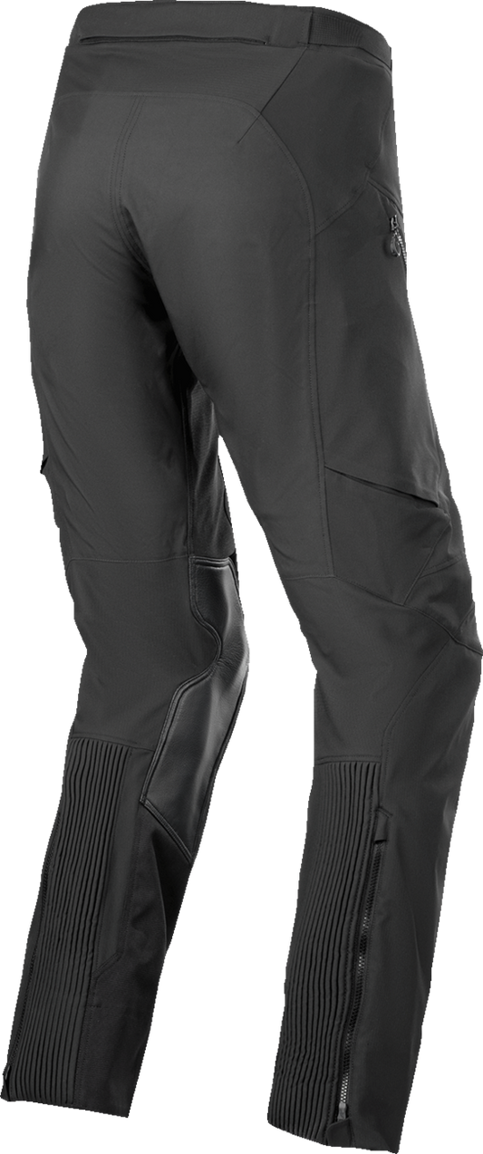 Alpinestars AMT-8 Stretch Drystar XF Pants in black, 3XL size, showing front view with reinforced knee areas and stretch fabric.